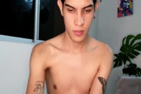 Skinny Latino teen With Tattoos And Earings Teases On cam